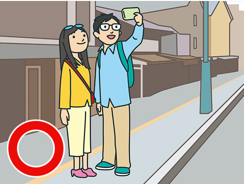 道路上の写真撮影で通行を妨げない